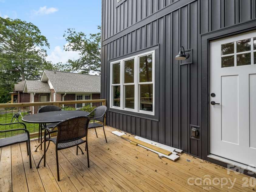 91 Winston Avenue, Asheville, NC 28803.  MLS# CAR4401592, YatesRealty ID 36478. Back deck