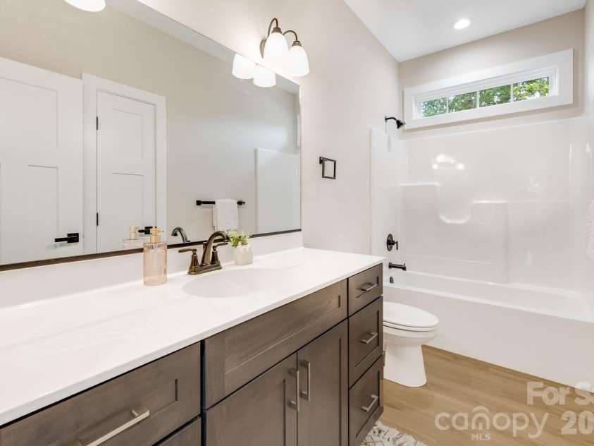 91 Winston Avenue, Asheville, NC 28803.  MLS# CAR4401592, YatesRealty ID 36478. Upper bathroom