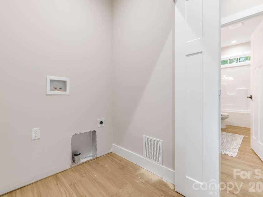 91 Winston Avenue, Asheville, NC 28803.  MLS# CAR4401592, YatesRealty ID 36478. Upper level laundry