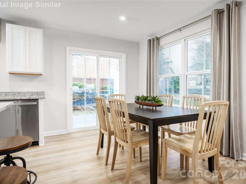 6160 Bridle Creek Drive, Charlotte, NC 28214.  MLS# CAR4403401, YatesRealty ID 36480. Come together over delicious meals and shared laughter—this dining space is made for moments that matter.