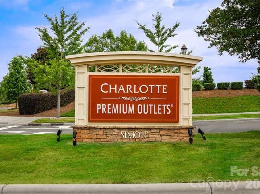 6160 Bridle Creek Drive, Charlotte, NC 28214.  MLS# CAR4403401, YatesRealty ID 36480. Retail therapy at its finest! Discover deals, style, and excitement at Charlotte Premium Outlets—shop, stroll, and score big!