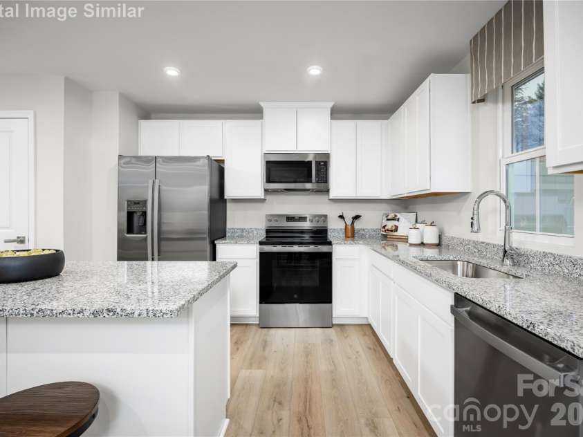 6160 Bridle Creek Drive, Charlotte, NC 28214.  MLS# CAR4403401, YatesRealty ID 36480. The kitchen that brings it all together—spacious, stylish, and designed for everyday living and unforgettable moments.