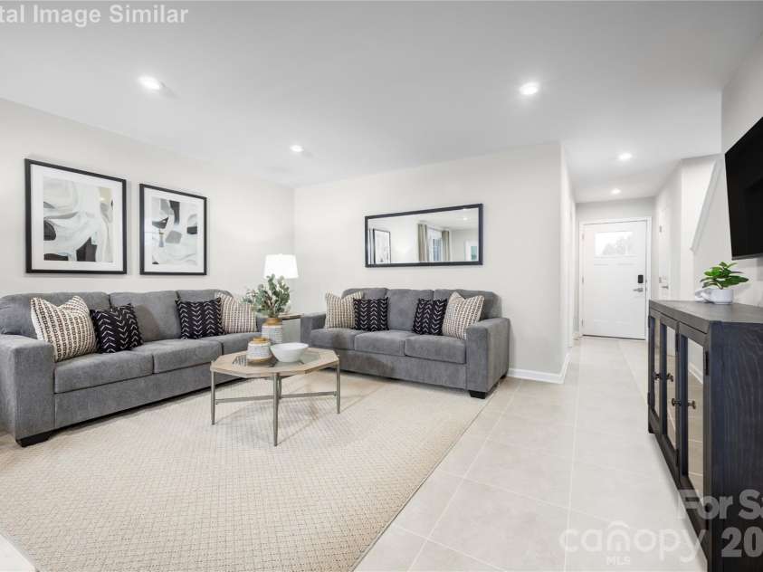 6160 Bridle Creek Drive, Charlotte, NC 28214.  MLS# CAR4403401, YatesRealty ID 36480. Unwind and connect—this Great Room is your go-to space for movie nights, family time, and everyday memories.