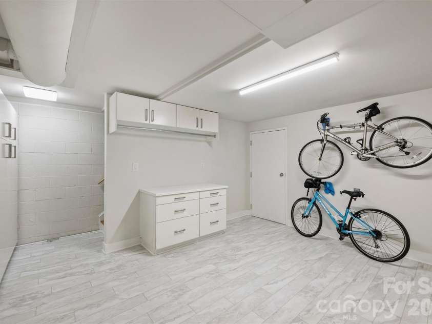 201 Hillside Avenue, Charlotte, NC 28209.  MLS# CAR4377112, YatesRealty ID 36500. This lower level flex space would be perfect for an Office, Studio, or Workout Room.