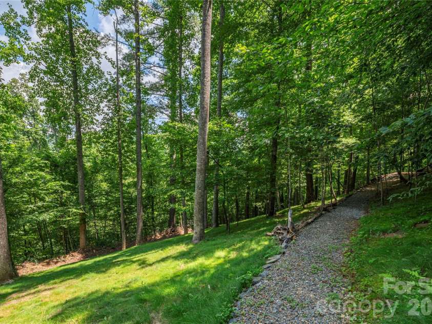 30 Garren View Drive, Fairview, NC 28730.  MLS# CAR4397082, YatesRealty ID 36503. Private path to patio