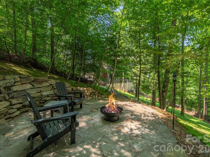 30 Garren View Drive, Fairview, NC 28730.  MLS# CAR4397082, YatesRealty ID 36503. Private patio with firepit
