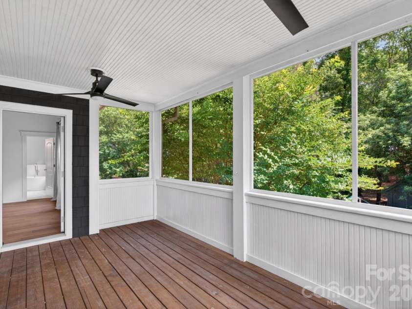 21313 Island Forest Drive, Cornelius, NC 28031.  MLS# CAR4386103, YatesRealty ID 36507. Porch off the primary bedroom