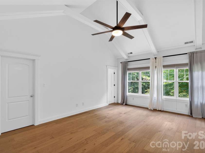 21313 Island Forest Drive, Cornelius, NC 28031.  MLS# CAR4386103, YatesRealty ID 36507. Primary Bedroom with Vaulted Ceilings