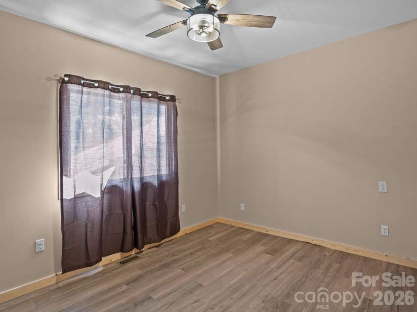 225 Aurora Lane, Tryon, NC 28782.  MLS# CAR4338061, YatesRealty ID 3653. 