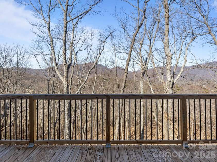 225 Aurora Lane, Tryon, NC 28782.  MLS# CAR4338061, YatesRealty ID 3653. Main Level Deck