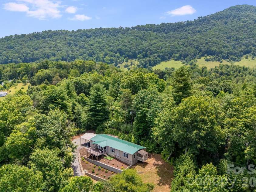 112 Reeves Road, Leicester, NC 28748.  MLS# CAR4392321, YatesRealty ID 36533. 