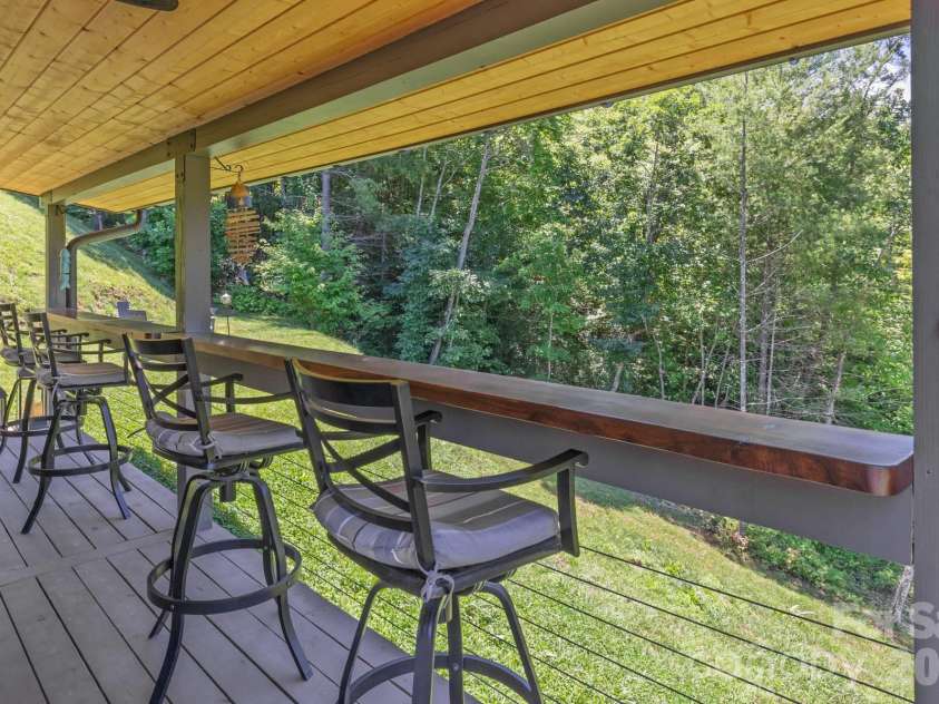 273 Alarka Point, Bryson City, NC 28713.  MLS# CAR4391193, YatesRealty ID 36534. Covered Deck behind Garage