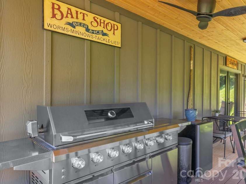 273 Alarka Point, Bryson City, NC 28713.  MLS# CAR4391193, YatesRealty ID 36534. Covered Deck behind Garage