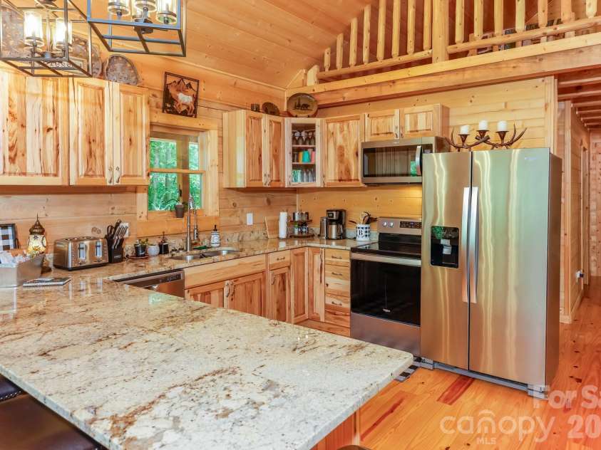 371 Redbird Drive, Lake Lure, NC 28746.  MLS# CAR4377100, YatesRealty ID 36539. 