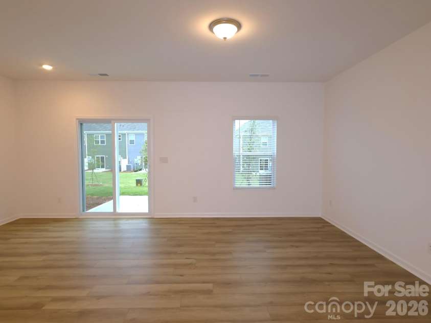 2704 Yeager Drive, Concord, NC 28027.  MLS# CAR4401233, YatesRealty ID 36541. Family room