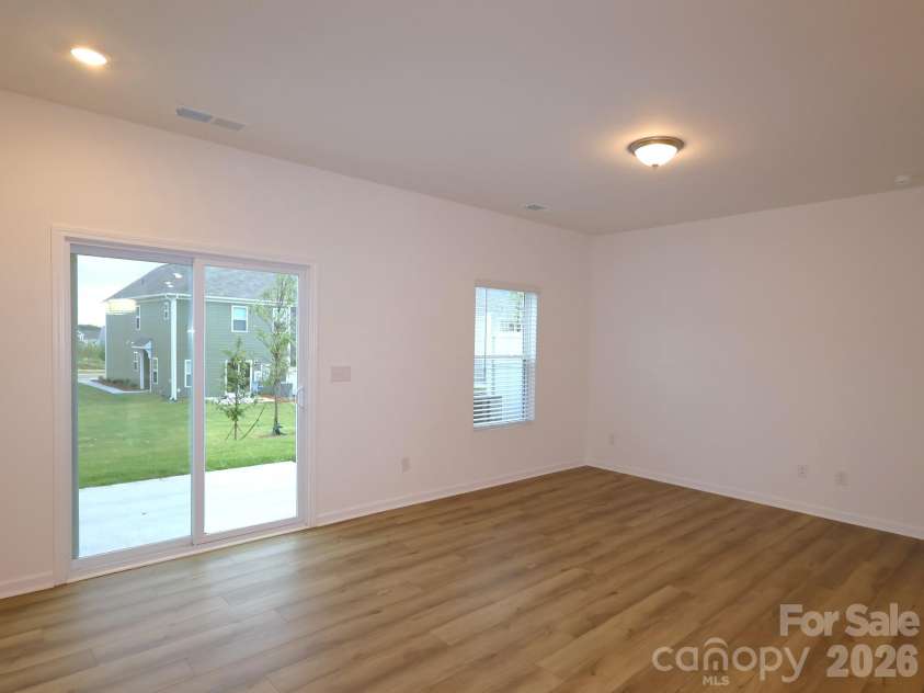 2704 Yeager Drive, Concord, NC 28027.  MLS# CAR4401233, YatesRealty ID 36541. Family room