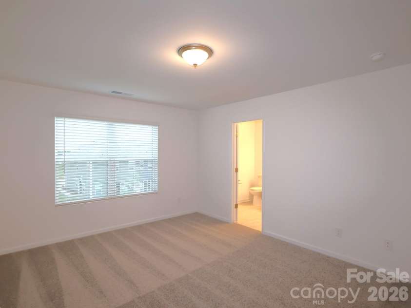 2704 Yeager Drive, Concord, NC 28027.  MLS# CAR4401233, YatesRealty ID 36541. Owner's suite