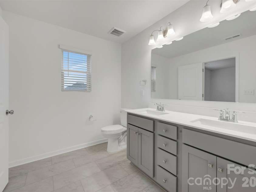 2704 Yeager Drive, Concord, NC 28027.  MLS# CAR4401233, YatesRealty ID 36541. Owner's suite