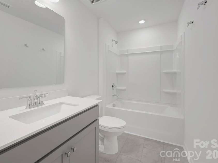 2704 Yeager Drive, Concord, NC 28027.  MLS# CAR4401233, YatesRealty ID 36541. Secondary bathroom