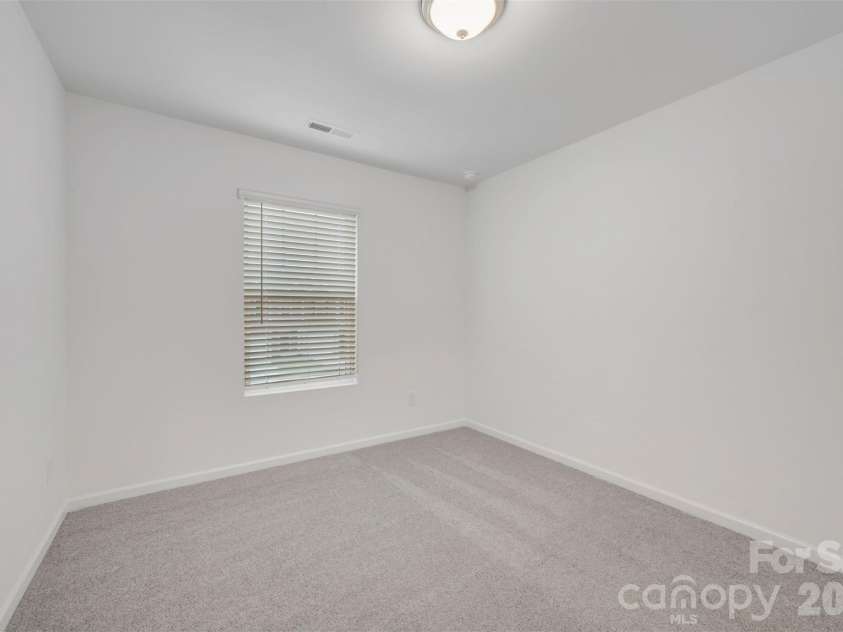 2704 Yeager Drive, Concord, NC 28027.  MLS# CAR4401233, YatesRealty ID 36541. Secondary bedroom