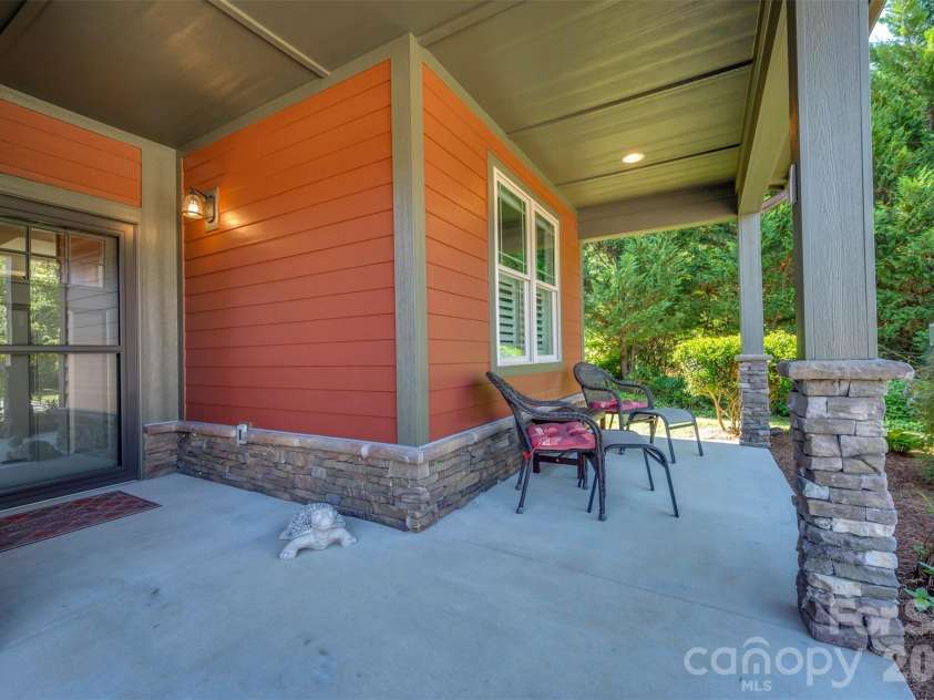 584 Summerfield Place, Flat Rock, NC 28731.  MLS# CAR4401680, YatesRealty ID 36549. Covered front porch