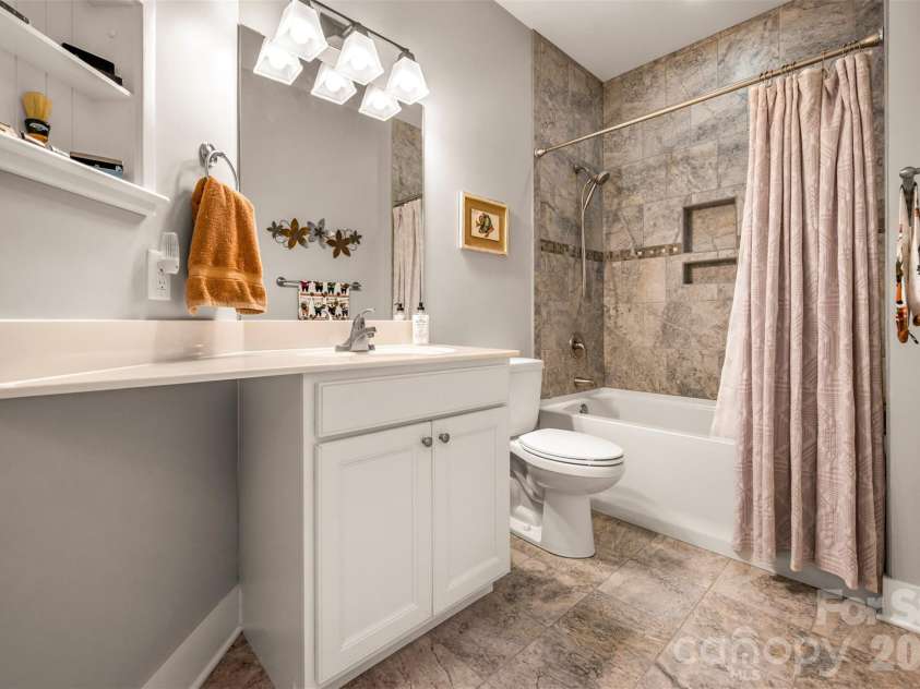 584 Summerfield Place, Flat Rock, NC 28731.  MLS# CAR4401680, YatesRealty ID 36549. Guest bath