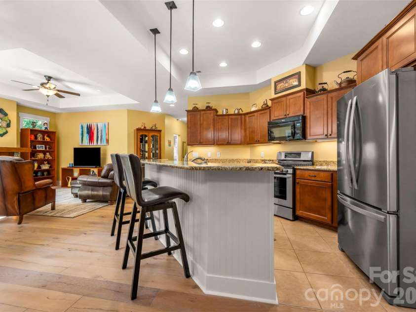 584 Summerfield Place, Flat Rock, NC 28731.  MLS# CAR4401680, YatesRealty ID 36549. Stainless appliances with gas range