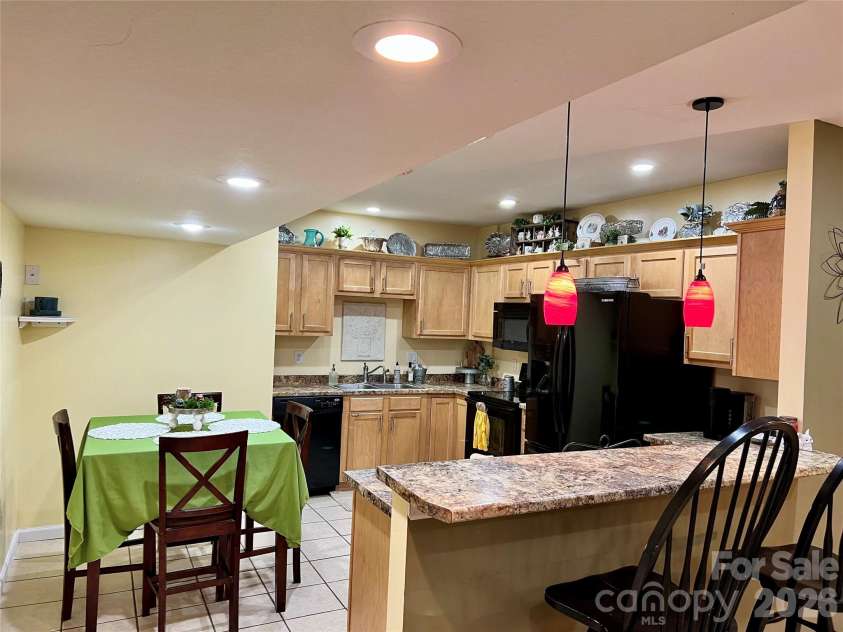 90 King Road, Weaverville, NC 28787.  MLS# CAR4397752, YatesRealty ID 36556. Basement Kitchen