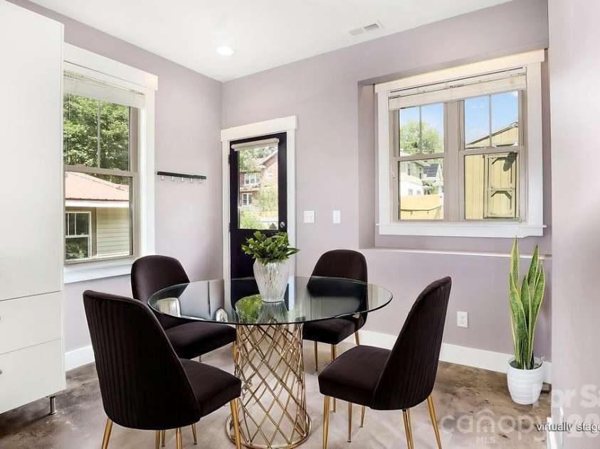 26 Mount Clare Avenue, Asheville, NC 28801.  MLS# CAR4293634, YatesRealty ID 3656. Enjoy meals in the sunlight dining area. Photo virtually staged.