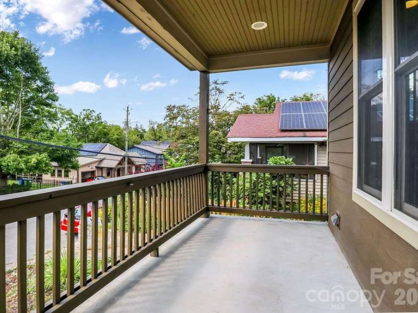 26 Mount Clare Avenue, Asheville, NC 28801.  MLS# CAR4293634, YatesRealty ID 3656. Entertain or relax on large the front porch.