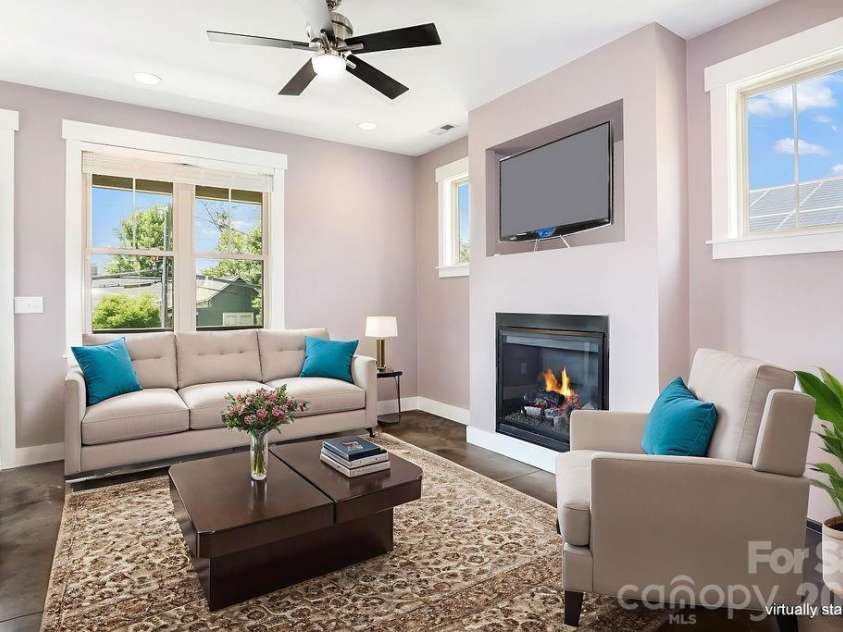 26 Mount Clare Avenue, Asheville, NC 28801.  MLS# CAR4293634, YatesRealty ID 3656. Savor cool eveings in front of the fire place. Photo virtually staged.