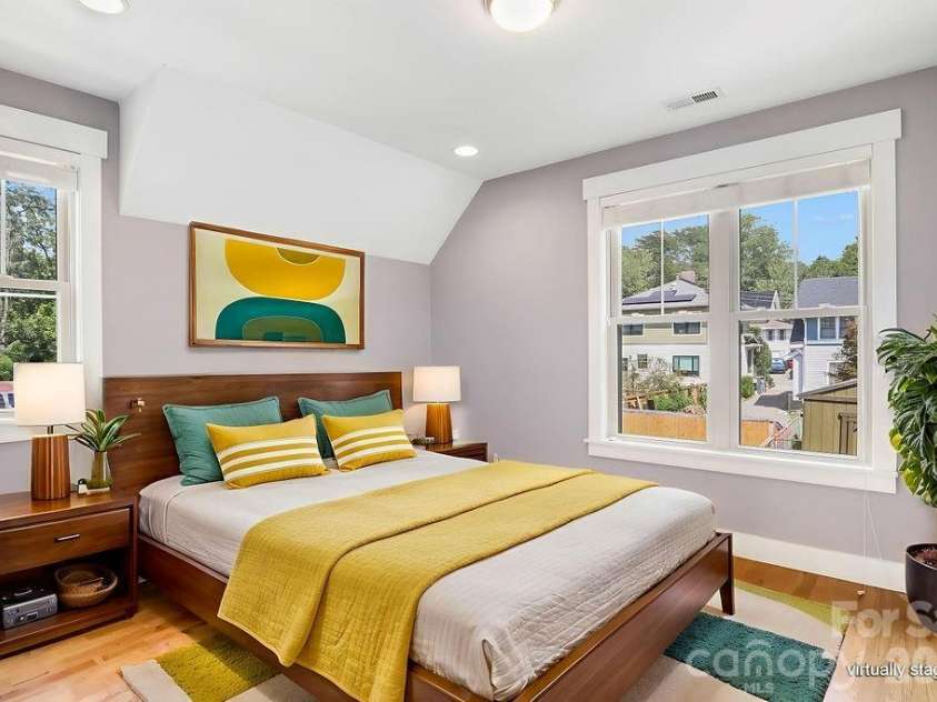 26 Mount Clare Avenue, Asheville, NC 28801.  MLS# CAR4293634, YatesRealty ID 3656. Upstairs guest bedroom. Photo virtually staged.