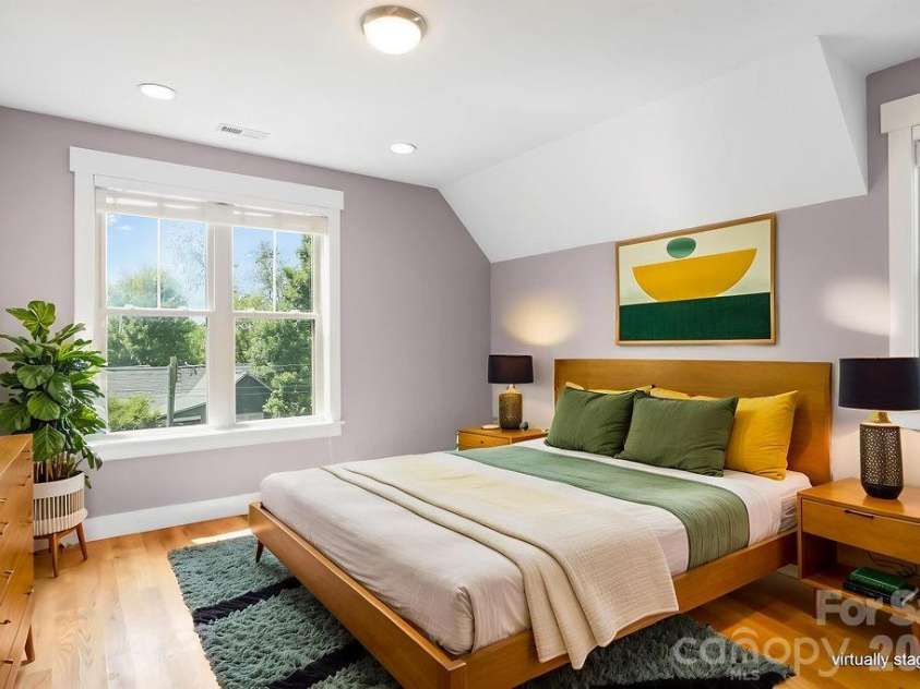 26 Mount Clare Avenue, Asheville, NC 28801.  MLS# CAR4293634, YatesRealty ID 3656. Upstairs primary bedroom. Photo virtually staged.