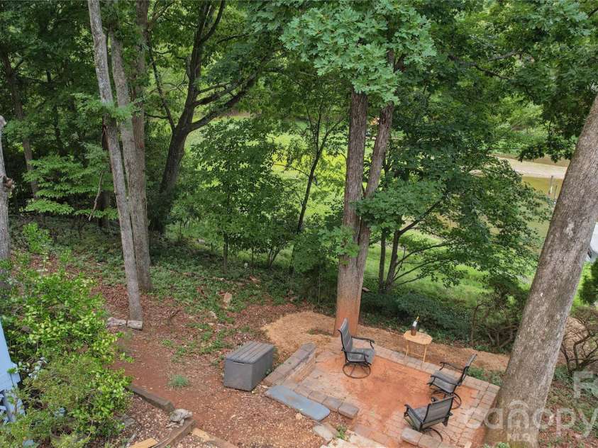 26049 Neptunes Landing, Tega Cay, SC 29708.  MLS# CAR4391310, YatesRealty ID 36563. Back yard