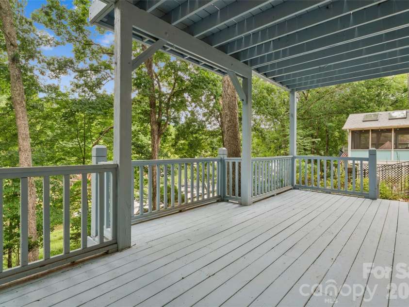 26049 Neptunes Landing, Tega Cay, SC 29708.  MLS# CAR4391310, YatesRealty ID 36563. Downstairs deck