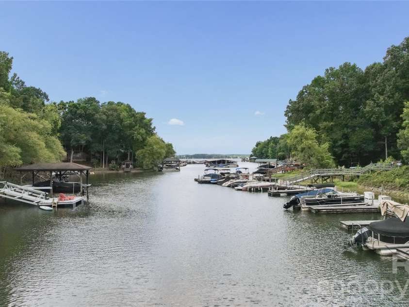 26049 Neptunes Landing, Tega Cay, SC 29708.  MLS# CAR4391310, YatesRealty ID 36563. Looking out at the channel