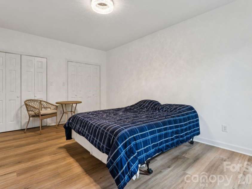 26049 Neptunes Landing, Tega Cay, SC 29708.  MLS# CAR4391310, YatesRealty ID 36563. Lower Level Bedroom
