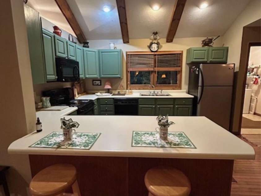 76 Azalea Court, Sapphire, NC 28774.  MLS# CAR4308118, YatesRealty ID 3657. Kitchen breakfast bar