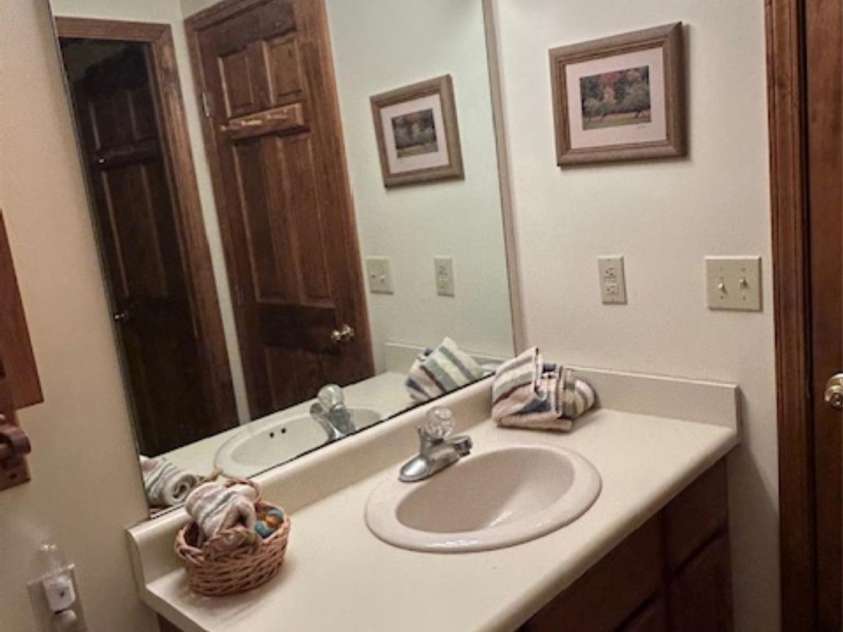 76 Azalea Court, Sapphire, NC 28774.  MLS# CAR4308118, YatesRealty ID 3657. Main level bathroom 