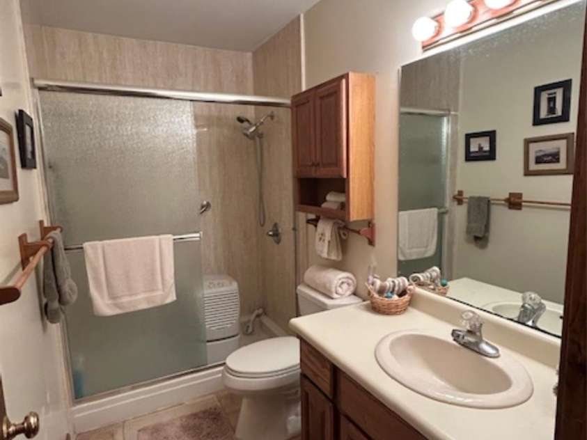 76 Azalea Court, Sapphire, NC 28774.  MLS# CAR4308118, YatesRealty ID 3657. Main level bathroom