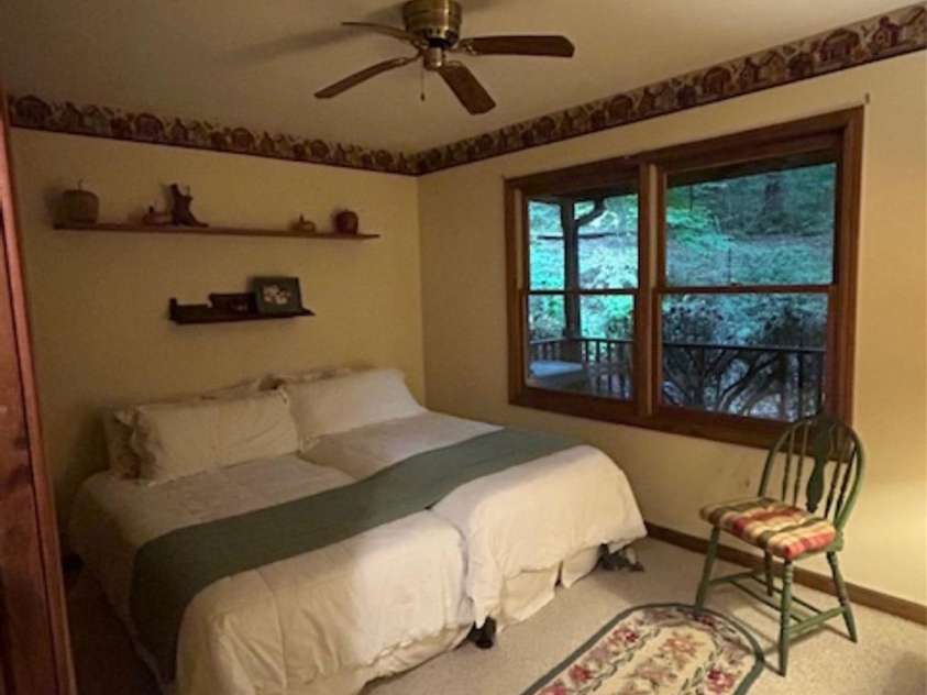 76 Azalea Court, Sapphire, NC 28774.  MLS# CAR4308118, YatesRealty ID 3657. Main level bedroom 1