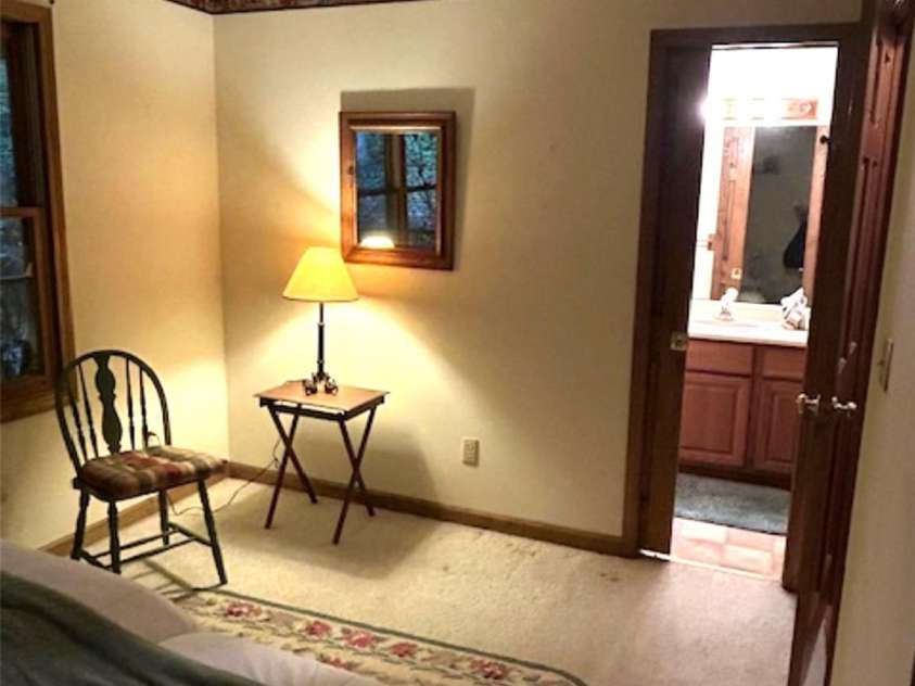 76 Azalea Court, Sapphire, NC 28774.  MLS# CAR4308118, YatesRealty ID 3657. Main level bedroom 1