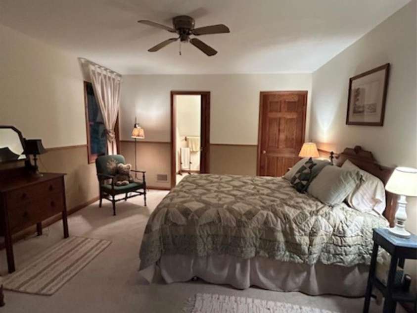 76 Azalea Court, Sapphire, NC 28774.  MLS# CAR4308118, YatesRealty ID 3657. Upstairs bedroom 