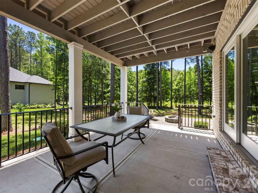 6039 Chimney Bluff Road, Lancaster, SC 29720.  MLS# CAR4378102, YatesRealty ID 36573. Basement Level Covered Patio
