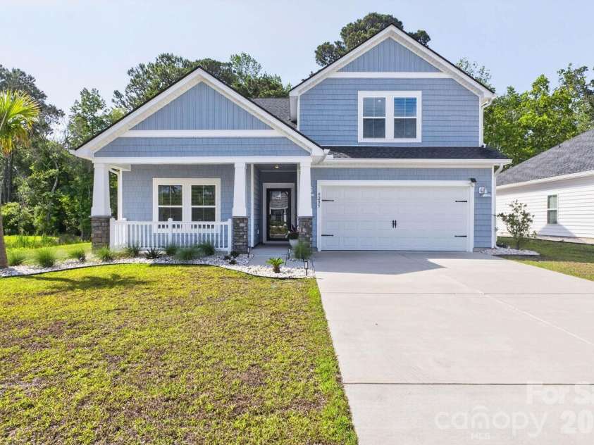 9205 Little Osprey Drive, Calabash, NC 28467.  MLS# CAR4398184, YatesRealty ID 36576. Front Elevation