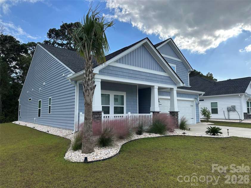 9205 Little Osprey Drive, Calabash, NC 28467.  MLS# CAR4398184, YatesRealty ID 36576. Front Elevation