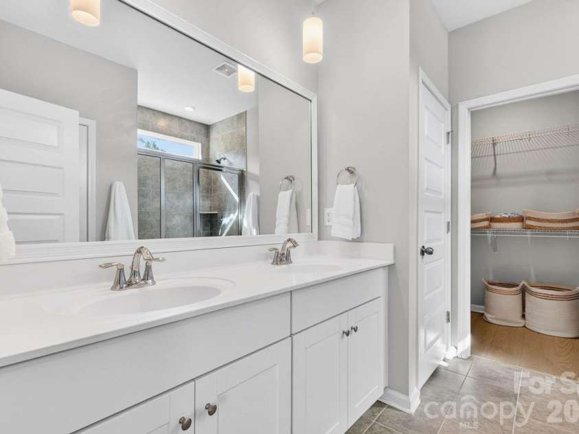 9205 Little Osprey Drive, Calabash, NC 28467.  MLS# CAR4398184, YatesRealty ID 36576. Primary bath
