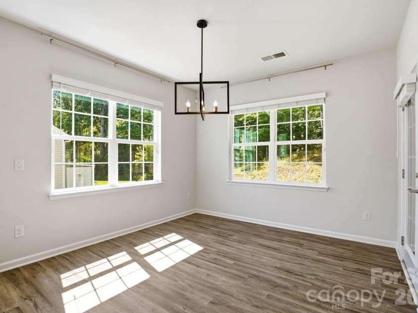 124 Goodleigh Lane, Mooresville, NC 28115.  MLS# CAR4353513, YatesRealty ID 36579. Dining Filled with Natural Light