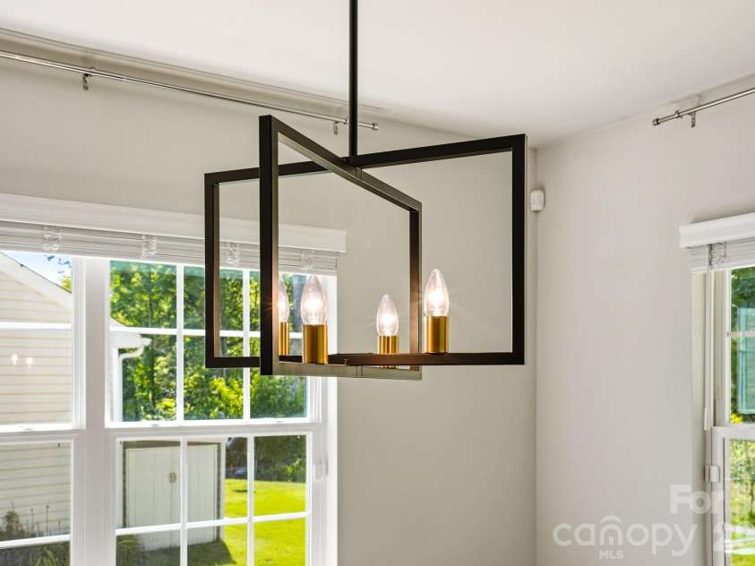 124 Goodleigh Lane, Mooresville, NC 28115.  MLS# CAR4353513, YatesRealty ID 36579. Enhanced with Updated Lighting