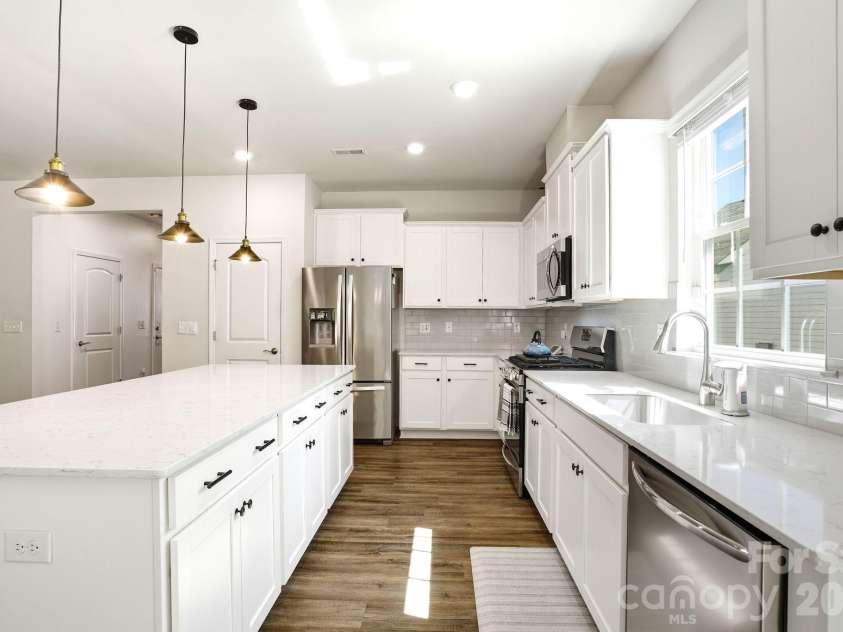124 Goodleigh Lane, Mooresville, NC 28115.  MLS# CAR4353513, YatesRealty ID 36579. Quartz Countertops with ample storage